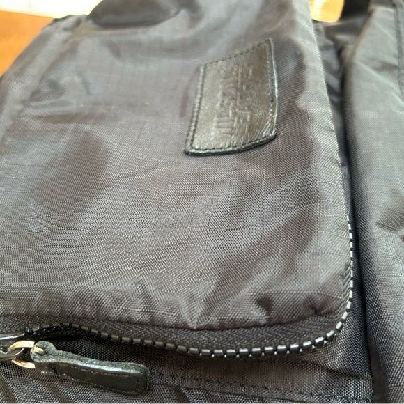 Wilson’s Leather Black nylon backpack, folds/compress out of sight. Ex condition - Picture 6 of 8